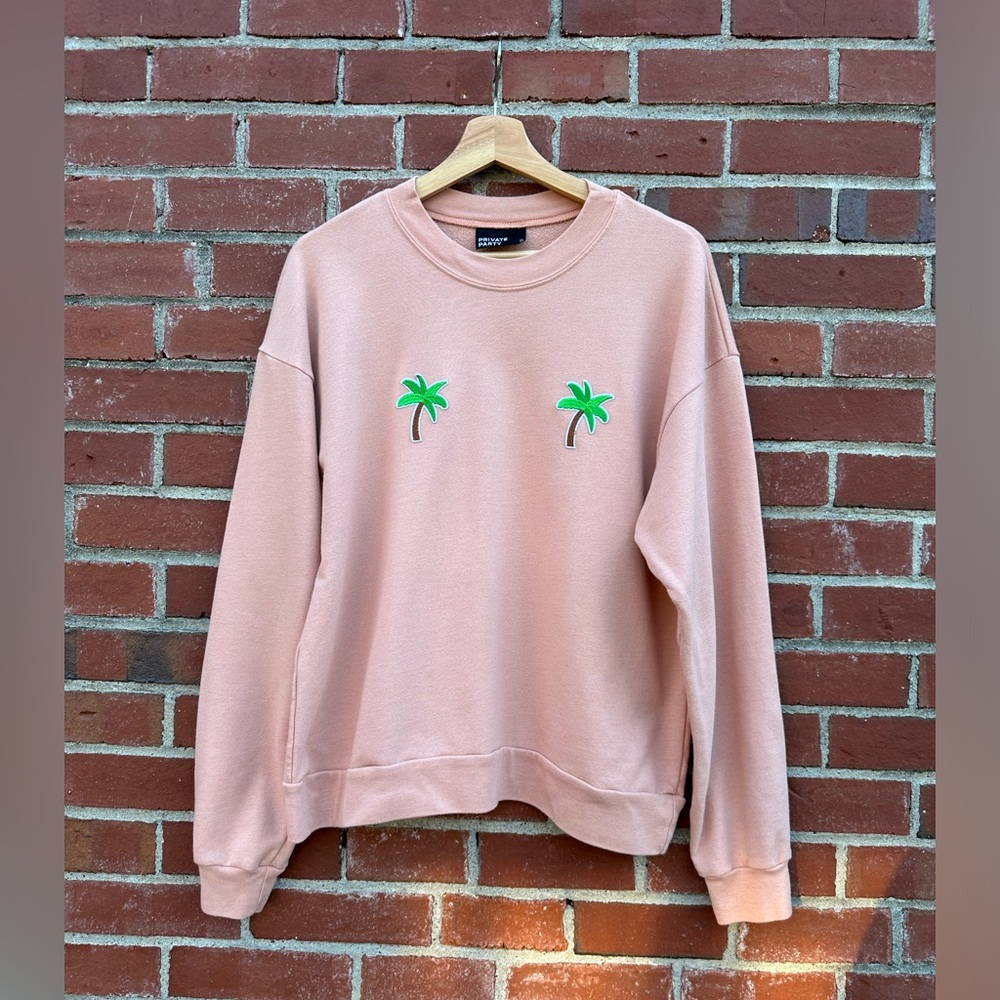 Private Party Palm Tree Sweatshirt. Pink. Cotton-poly blend. Size small.